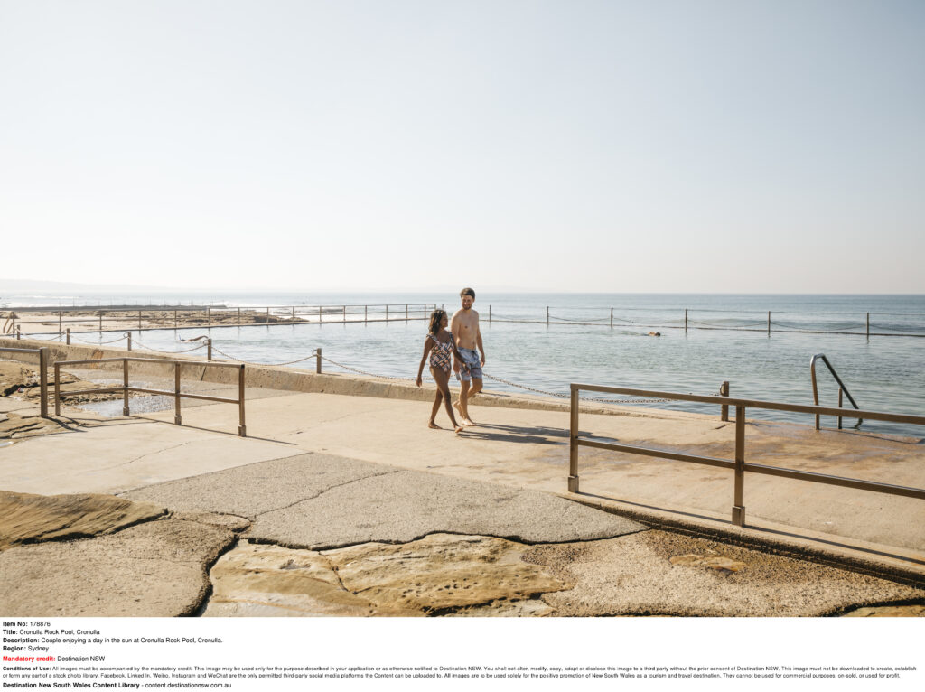 Couple enjoying a day in the sun at Cronulla Rock Pool, Cronulla.