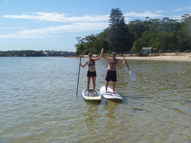 Having fun stand up paddle boarding in Bundeena