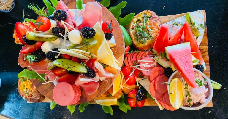 Cured meats, ast cheeses marinated olives, seasonal fruit, crackers, smoke trout cob loaf.