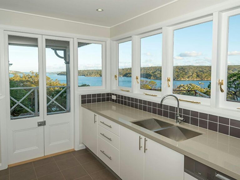 The kitchen with view of Port Hacking in Hilltop Cottage, Royal National Park. Photo: John Spencer