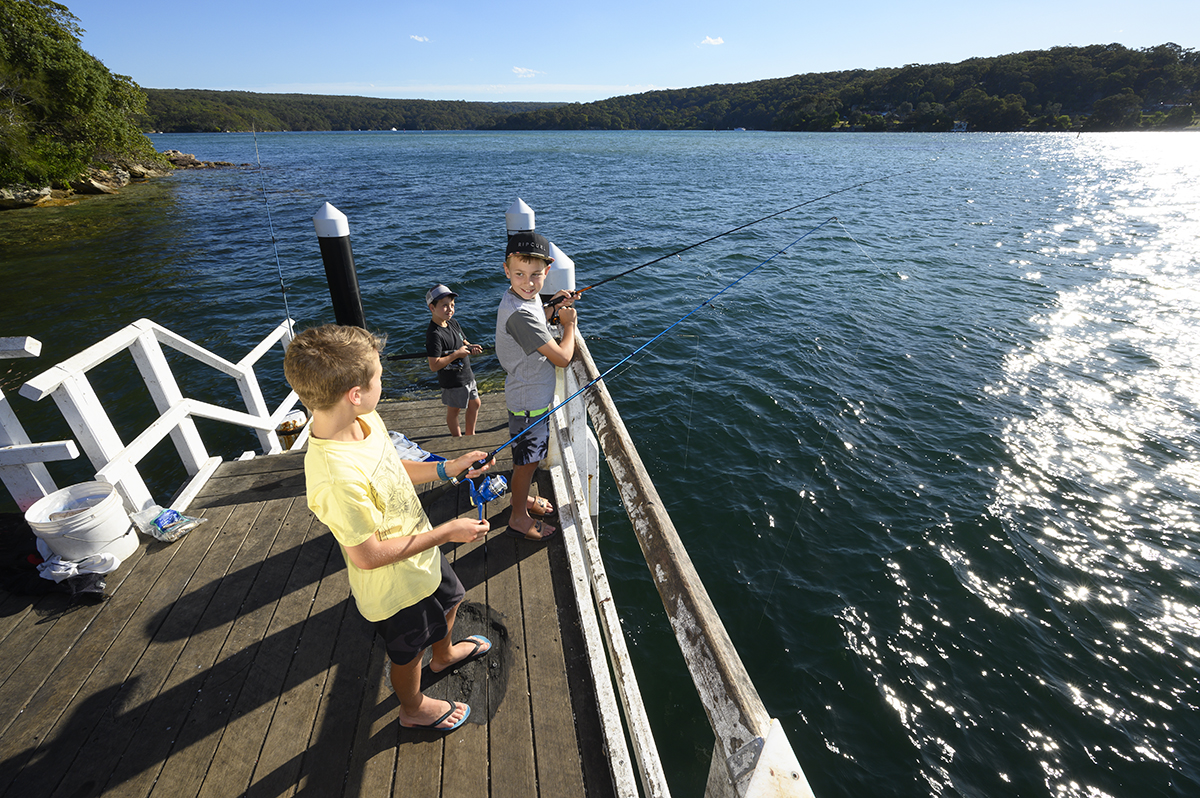 Boys fishing at Lilli Pilli on the Hacking River