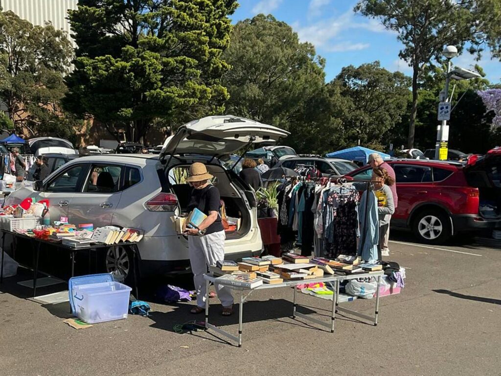 People looking at items for sale