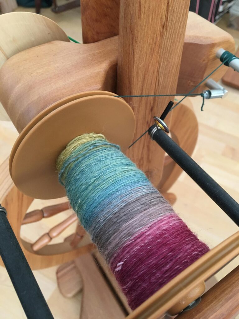 Spinning a single from hand dyed fibre