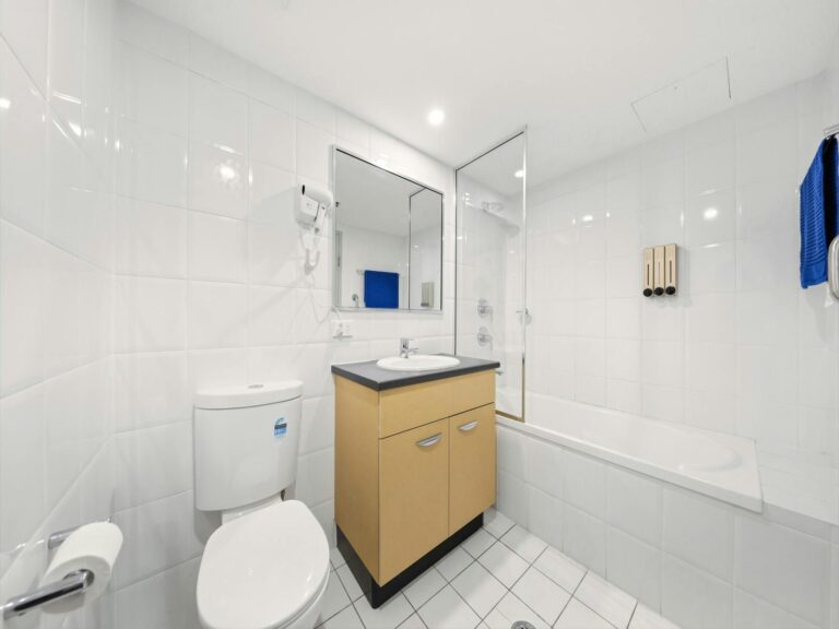 Clean bathroom with bathtub