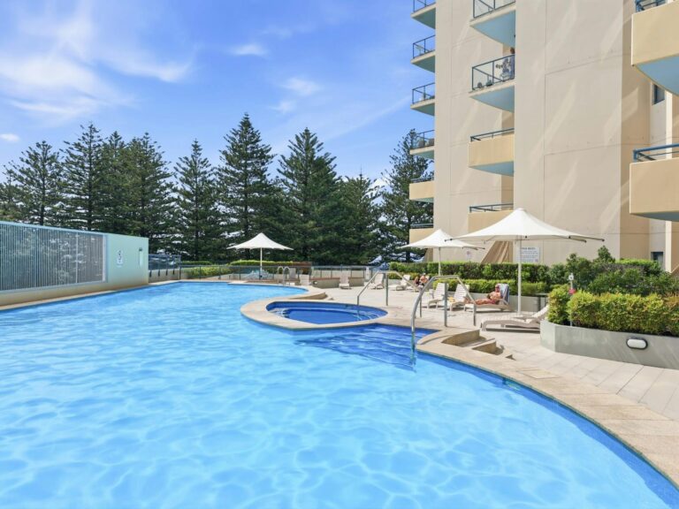 Outdoor swimming pool with lounge area