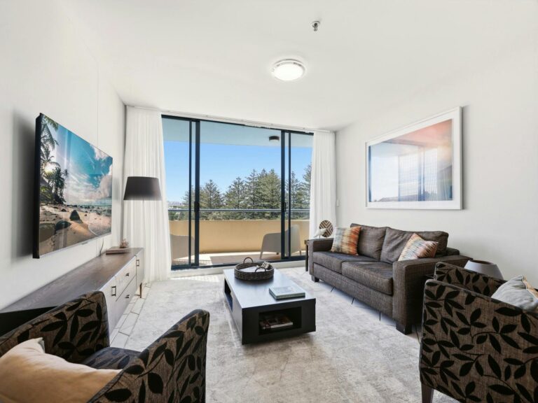 Bright living room with balcony access